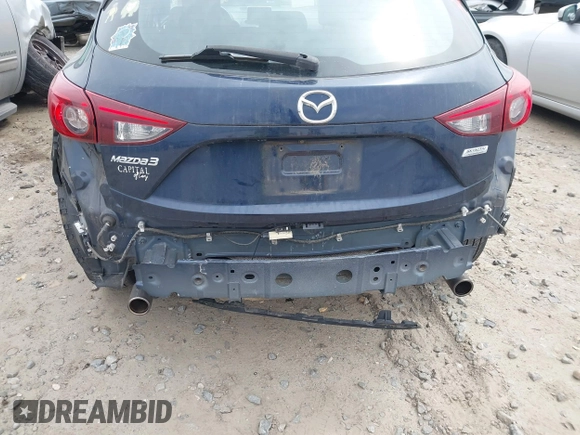2014 Mazda 3 i Grand Touring with VIN JM1BM1M77E1133477, listed as a IAAI auction lot 41861051 with 124,377 mi miles and . Bid and sale history available at DreamBid. Image 6.