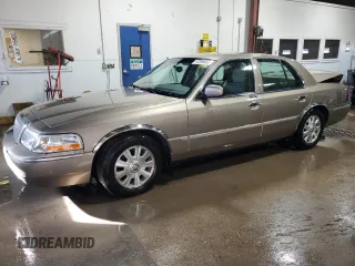 2003 Mercury Grand Marquis LS Premium with VIN 2MEFM75W13X668365, listed as a Copart auction lot 47206555 with 97,646 mi miles and Salvage Title. Bid and sale history available at DreamBid. Image 1.