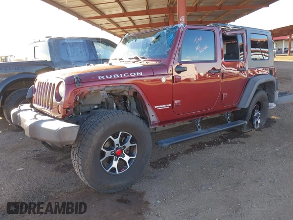 2010 Jeep Wrangler Unlimited Rubicon with VIN 1J4BA6H14AL110534, listed as a IAAI auction lot 41382867 with 246,087 mi miles and . Bid and sale history available at DreamBid. Image 18.