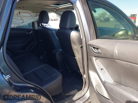 2014 Mazda CX-5 Grand Touring with VIN JM3KE4DY1E0364685, listed as a IAAI auction lot 41665349 with 135,751 mi miles. Bid and sale history available at carsss.com. Image 8.