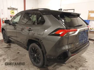 2023 Toyota RAV4 Hybrid XSE with VIN 4T3E6RFV7PU124140, listed as a IAAI auction lot 42201073 with 50,942 mi miles and . Bid and sale history available at DreamBid. Image 3.