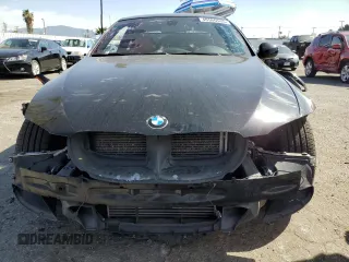 2012 BMW 3 Series 335is with VIN WBAKG1C5XCJ217018, listed as a Copart auction lot 46566545 with 57,465 mi miles and Salvage title. Bid and sale history available at DreamBid. Image 5.