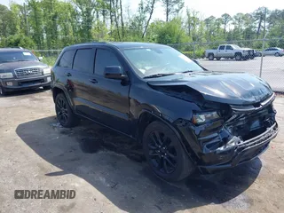 2018 Jeep Grand Cherokee Altitude with VIN 1C4RJEAG7JC354191, listed as a IAAI auction lot 42276081 with 51,220 mi miles and . Bid and sale history available at DreamBid. Image 1.