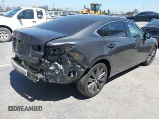 2018 Mazda Mazda6 Touring with VIN JM1GL1VM1J1320592, listed as a IAAI auction lot 41985616 with 100,920 mi miles. Bid and sale history available at carsss.com. Image 4.