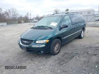 1999 Chrysler Town & Country with VIN 1C4GP54G6XB603564, listed as a IAAI auction lot 41823340 with 104,321 mi miles and . Bid and sale history available at DreamBid. Image 18.