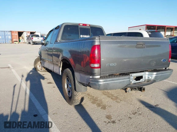 2002 Ford F-150 XL with VIN 1FTRX17L52NA85965, listed as a IAAI auction lot 41796633 with 171,814 mi miles. Bid and sale history available at carsss.com. Image 3.