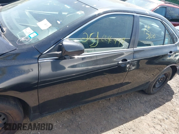 2015 Toyota Camry LE z VIN 4T1BD1FK7FU159767, wystawiony jako IAAI lot #42175153 z przebiegiem Nie podano mil oraz . Historia ofert i sprzedaży dostępna na DreamBid. Obrazek 13.