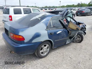 1995 Honda Civic LX z VIN 1HGEG8550SL031739, wystawiony jako IAAI lot #42291670 z przebiegiem 207 500 mil mil oraz . Historia ofert i sprzedaży dostępna na DreamBid. Obrazek 4.