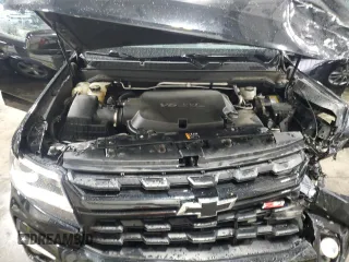 2021 Chevrolet Colorado 4WD Z71 with VIN 1GCGTDEN8M1171810, listed as a Copart auction lot 57409115 with 100,579 mi miles and Salvage title. Bid and sale history available at DreamBid. Image 11.