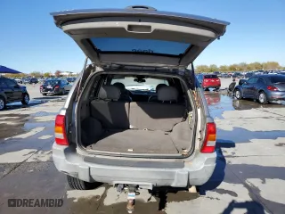 1999 Jeep Grand Cherokee Laredo with VIN 1J4GW58NXXC776438, listed as a Copart auction lot 84412044 with 163,060 mi miles and Salvage Title. Bid and sale history available at carsss.com. Image 6.