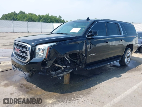 2016 GMC Yukon XL SLE with VIN 1GKS1FKC9GR161876, listed as a IAAI auction lot 39948106 with 60,800 mi miles. Bid and sale history available at carsss.com. Image 17.