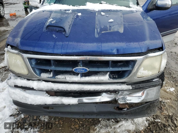 1997 Ford F-150 XL with VIN 1FTEX17LXVKB44786, listed as a Copart auction lot 49630955 with 301,736 mi miles and Salvage title. Bid and sale history available at DreamBid. Image 13.