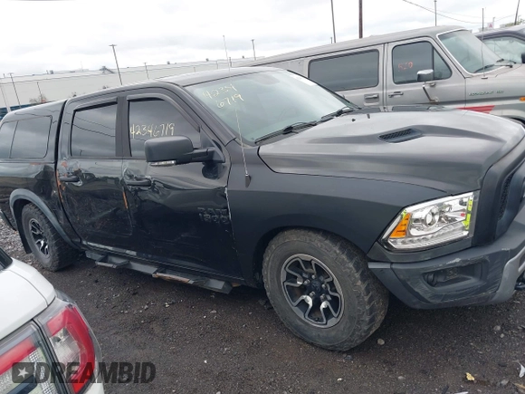 2016 Ram 1500 Rebel z VIN 1C6RR7YT0GS100285, wystawiony jako IAAI lot #42346719 z przebiegiem 103 309 mil mil oraz . Historia ofert i sprzedaży dostępna na DreamBid. Obrazek 13.