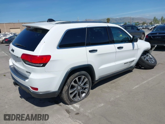 2018 Jeep Grand Cherokee Limited with VIN 1C4RJFBG3JC245943, listed as a IAAI auction lot 42287279 with 107,719 mi miles and . Bid and sale history available at DreamBid. Image 4.