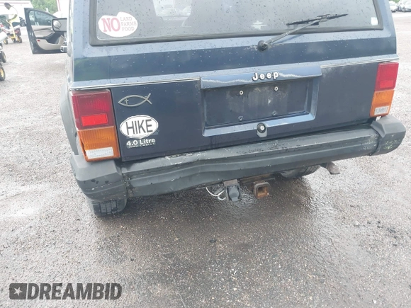 1996 Jeep Cherokee SE z VIN 1J4FJ28S5TL129065, wystawiony jako IAAI lot #42231133 z przebiegiem 225 320 mil mil oraz . Historia ofert i sprzedaży dostępna na DreamBid. Obrazek 6.