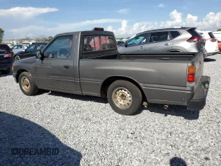 1995 Isuzu Pickup S z VIN JAACL11L8S7200788, wystawiony jako Copart lot #51145765 z przebiegiem 328 108 mil mil oraz Tytuł czysty. Historia ofert i sprzedaży dostępna na DreamBid. Obrazek 2.
