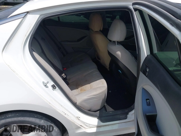 2015 Kia Optima LX with VIN KNAGM4A76F5639319, listed as a IAAI auction lot 42552130 with 207,006 mi miles and . Bid and sale history available at DreamBid. Image 8.