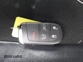 2018 Jeep Grand Cherokee Altitude z VIN 1C4RJFAGXJC190814, wystawiony jako IAAI lot #42660901 z przebiegiem 127 632 mil mil oraz . Historia ofert i sprzedaży dostępna na DreamBid. Obrazek 11.