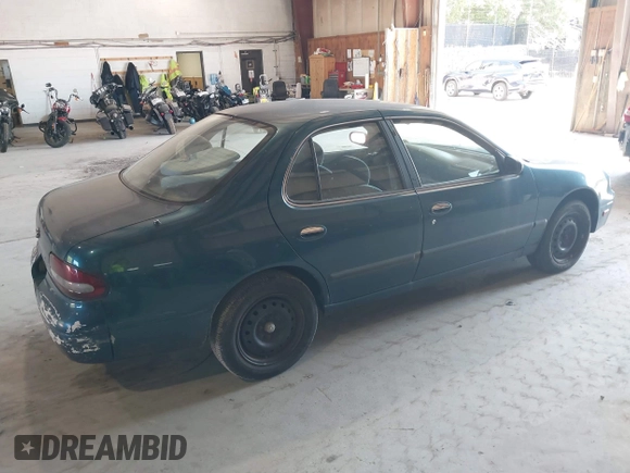 1996 Nissan Altima XE with VIN 1N4BU31D4TC139105, listed as a IAAI auction lot 40241213 with 115,817 mi miles and . Bid and sale history available at DreamBid. Image 4.