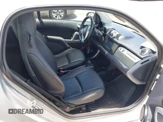 2013 Smart fortwo Pure with VIN WMEEJ3BA8DK605597, listed as a IAAI auction lot 42395754 with 55,637 mi miles and . Bid and sale history available at DreamBid. Image 5.