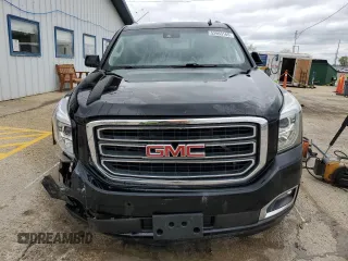 2015 GMC Yukon SLT z VIN 1GKS2BKC1FR112708, wystawiony jako Copart lot #53963165 z przebiegiem 123 331 mil mil oraz Szkoda całkowita • Salvage title. Historia ofert i sprzedaży dostępna na DreamBid. Obrazek 5.