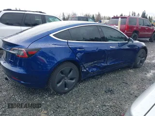 2019 Tesla Model 3 Long Range with VIN 5YJ3E1EB8KF512950, listed as a IAAI auction lot 41836349 with 55,607 mi miles and . Bid and sale history available at DreamBid. Image 4.