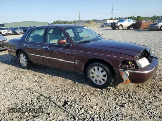 2003 Mercury Grand Marquis LS Premium with VIN 2MEFM75W03X606245, listed as a Copart auction lot 50795125 with 207,117 mi miles and Salvage Title. Bid and sale history available at DreamBid. Image 4.