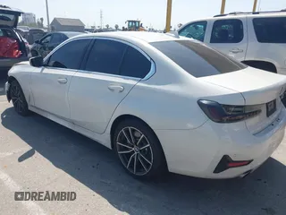 2019 BMW 3 Series 330i with VIN WBA5R1C50KFH26305, listed as a IAAI auction lot 41965645 with 71,150 mi miles and . Bid and sale history available at DreamBid. Image 14.