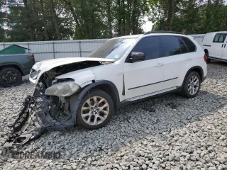 2012 BMW X5 35i z VIN 5UXZV4C53CL748735, wystawiony jako Copart lot #60670445 z przebiegiem Nie podano mil oraz Szkoda całkowita • Salvage title. Historia ofert i sprzedaży dostępna na DreamBid. Obrazek 1.