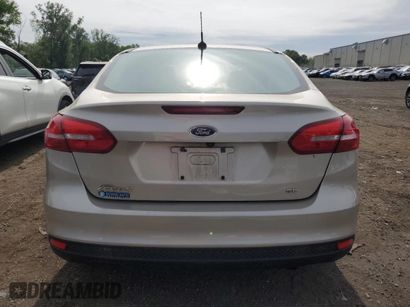 2017 Ford Focus SE z VIN 1FADP3F24HL291870, wystawiony jako Copart lot #60851275 z przebiegiem 83 334 mil mil oraz Szkoda całkowita • Salvage title. Historia ofert i sprzedaży dostępna na DreamBid. Obrazek 6.