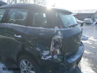 2013 MINI Cooper Countryman with VIN WMWZB3C53DWM08700, listed as a IAAI auction lot 41402093 with 71,109 mi miles. Bid and sale history available at carsss.com. Image 6.