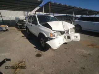 2004 Isuzu Rodeo S z VIN 4S2CK58W044317034, wystawiony jako Copart lot #42401765 z przebiegiem 110 639 mil mil oraz Szkoda całkowita • Salvage title. Historia ofert i sprzedaży dostępna na DreamBid. Obrazek 11.