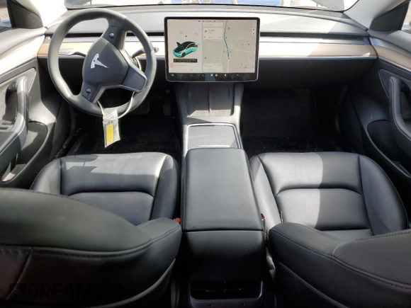 2021 Tesla Model 3 Standard Range Plus with VIN 5YJ3E1EA7MF053663, listed as a Copart auction lot 51982265 with 90,529 mi miles and Salvage Title. Bid and sale history available at DreamBid. Image 8.