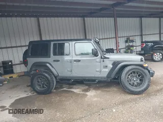 2020 Jeep Wrangler Unlimited Sport S z VIN 1C4HJXDG1LW103364, wystawiony jako IAAI lot #41541954 z przebiegiem 57 735 mil mil oraz . Historia ofert i sprzedaży dostępna na DreamBid. Obrazek 13.