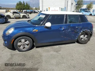 2016 MINI Hardtop 4 Door with VIN WMWXU1C57G2D09365, listed as a Copart auction lot 47688655 with 86,973 mi miles and Salvage Title. Bid and sale history available at DreamBid. Image 1.