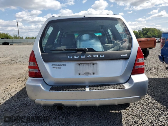 2003 Subaru Forester XS with VIN JF1SG65663H755380, listed as a Copart auction lot 69022344 with 148,658 mi miles and Salvage Title. Bid and sale history available at carsss.com. Image 6.