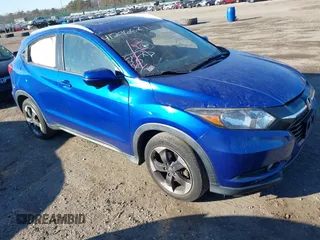 2018 Honda HR-V EX-L Navi with VIN 3CZRU6H74JM705814, listed as a IAAI auction lot 41296671 with 56,702 mi miles. Bid and sale history available at carsss.com. Image 1.