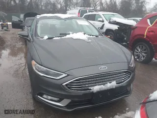 2017 Ford Fusion Energi SE with VIN 3FA6P0PU6HR203037, listed as a IAAI auction lot 41567334 with 96,852 mi miles. Bid and sale history available at carsss.com. Image 12.