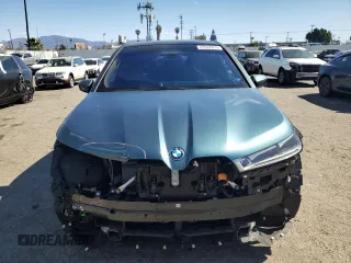 2023 BMW iX M60 with VIN WB533CF01PCM82043, listed as a Copart auction lot 47447815 with 9,058 mi miles and Salvage Title. Bid and sale history available at carsss.com. Image 5.