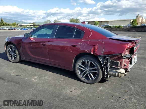 2019 Dodge Charger SXT with VIN 2C3CDXJG4KH757928, listed as a Copart auction lot 51670565 with 93,406 mi miles and Salvage Title. Bid and sale history available at DreamBid. Image 2.