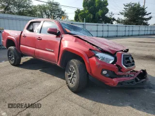 2023 Toyota Tacoma SR with VIN 3TMCZ5AN2PM605302, listed as a Copart auction lot 60495855 with 41,264 mi miles and Clean title. Bid and sale history available at DreamBid. Image 4.