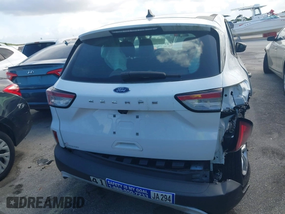 2021 Ford Escape S with VIN 1FMCU0F61MUA36822, listed as a IAAI auction lot 31372199 with 3,842 mi miles and . Bid and sale history available at DreamBid. Image 15.