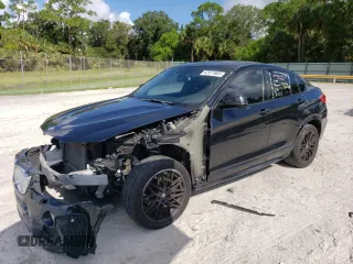 2015 BMW X4 xDrive28i with VIN 5UXXW3C50F0M87505, listed as a Copart auction lot 62977803 with 115,754 mi miles. Bid and sale history available at carsss.com. Image 1.