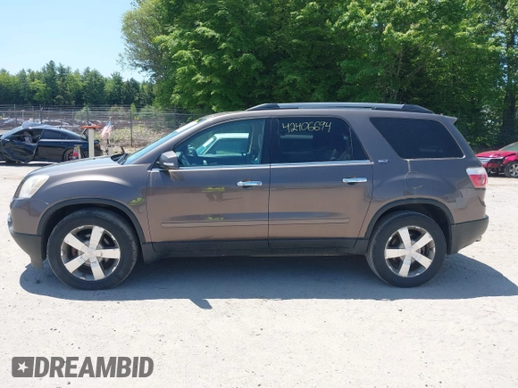 2012 GMC Acadia SLT2 z VIN 1GKKVSED0CJ326823, wystawiony jako IAAI lot #42406694 z przebiegiem 173 825 mil mil oraz . Historia ofert i sprzedaży dostępna na DreamBid. Obrazek 12.