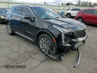 2021 Cadillac XT4 AWD Premium Luxury with VIN 1GYFZDR4XMF016846, listed as a Copart auction lot 82963704 with 44,063 mi miles and Salvage Title. Bid and sale history available at carsss.com. Image 12.