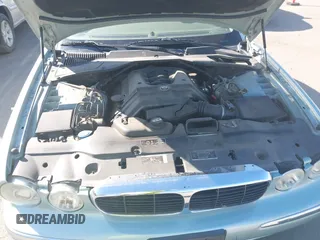 2004 Jaguar XJ 8 with VIN SAJEA71CX4SG10751, listed as a IAAI auction lot 42149348 with 89,786 mi miles and . Bid and sale history available at DreamBid. Image 10.