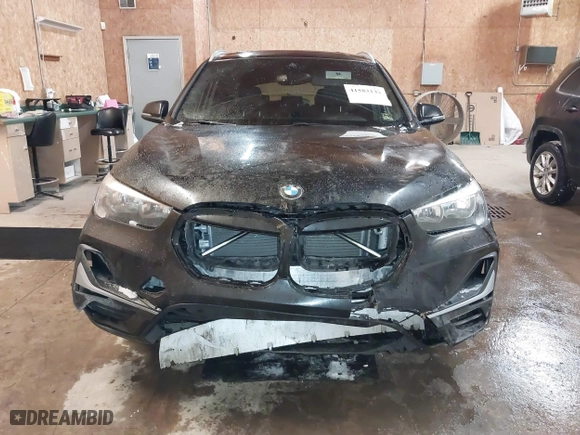 2020 BMW X1 xDrive28i with VIN WBXJG9C07L5P71792, listed as a IAAI auction lot 41583132 with 150,095 mi miles. Bid and sale history available at carsss.com. Image 12.
