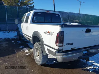 1999 Ford Super Duty F-250 XL with VIN 1FTNW21F9XEC14744, listed as a IAAI auction lot 41290325 with 200,113 mi miles. Bid and sale history available at carsss.com. Image 3.