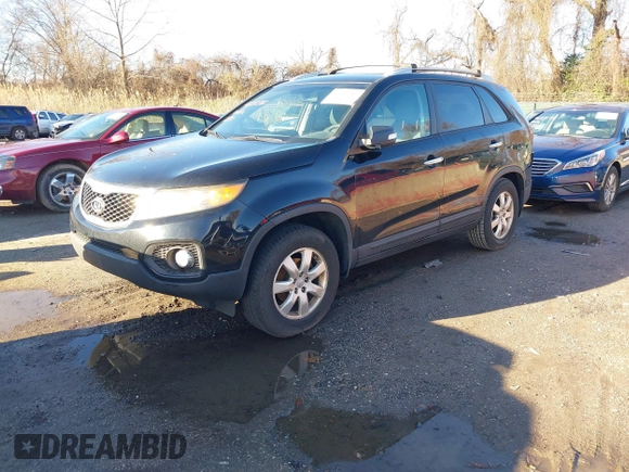 2012 Kia Sorento LX with VIN 5XYKT4A67CG231633, listed as a IAAI auction lot 41210382 with 217,055 mi miles. Bid and sale history available at carsss.com. Image 2.