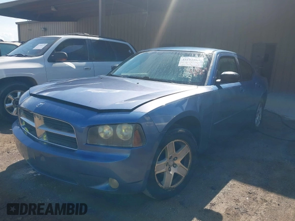 2007 Dodge Charger with VIN 2B3KA43G47H814908, listed as a IAAI auction lot 42111864 with 217,073 mi miles. Bid and sale history available at carsss.com. Image 2.